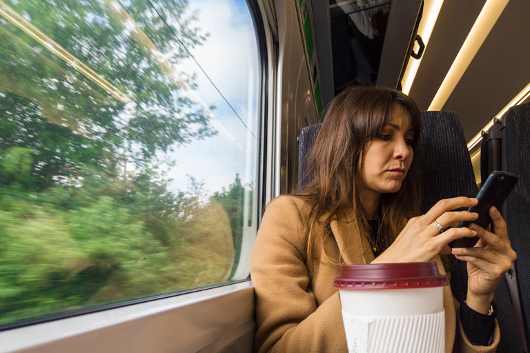 Woman without mask on train