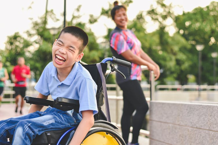 Smiling boy in wheelchair