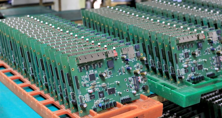 A row of computer circuit boards.