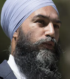 Jagmeet Singh in a pale blue turban.