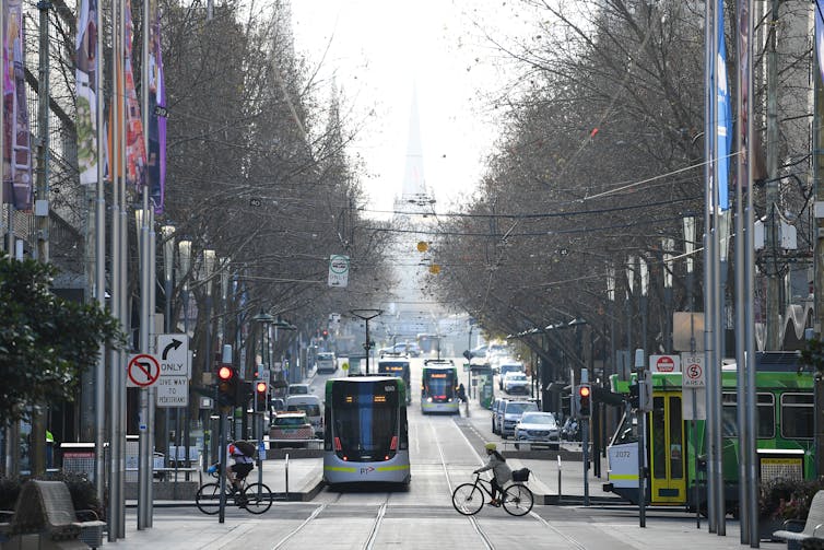 Melbourne CBD intersection on a grey day.