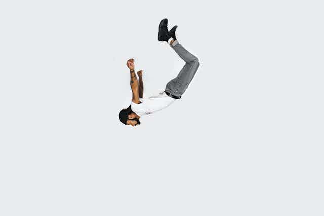 Hip hop dancer seems to fall through the air