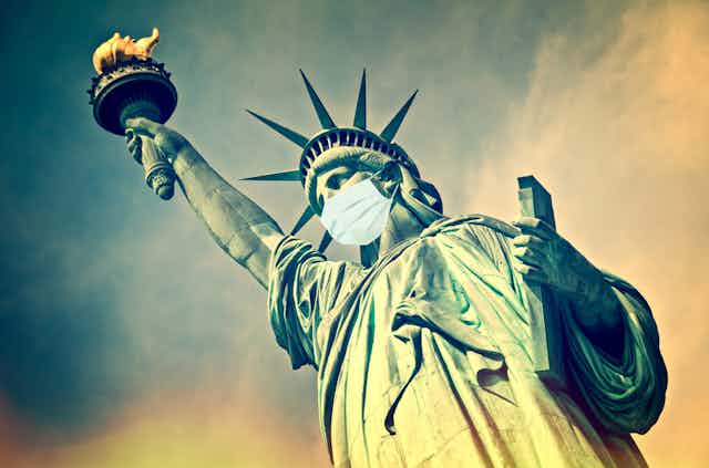 Illustration of the Statue of Liberty wearing a face mask