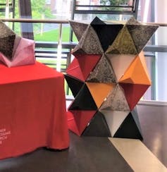 An object construction of different coloured pyramid blocks