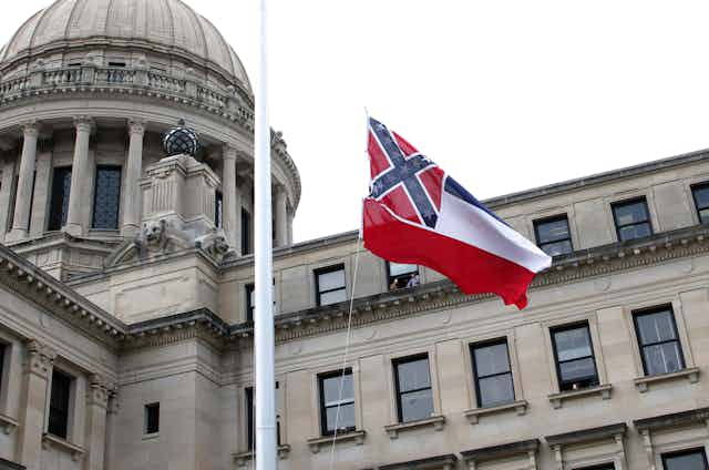 The Mississippi state flag flies at the state capitol.