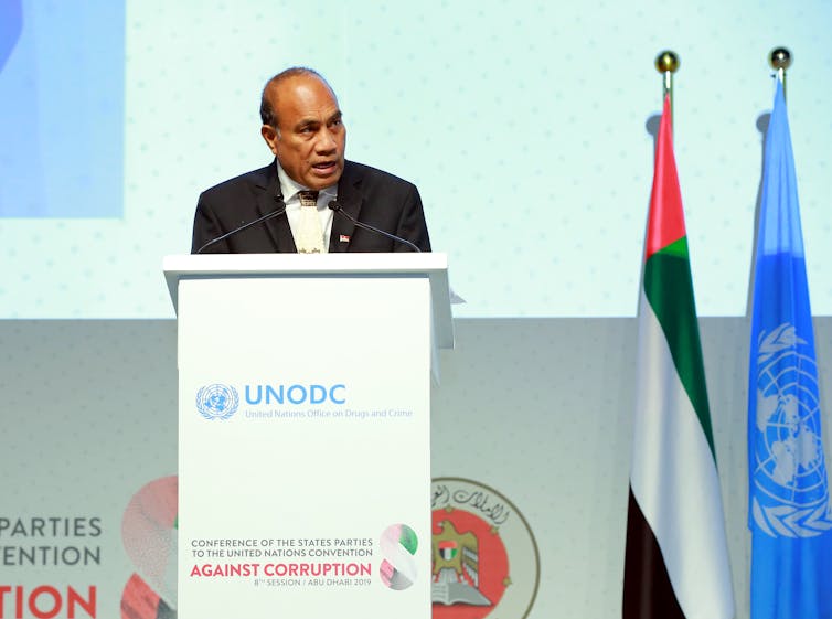 President Taneti Maamau stands behind a podium at a UN
conference.