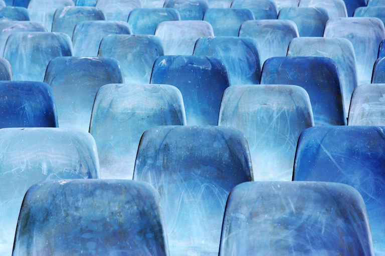 Empty chairs in lecture hall.