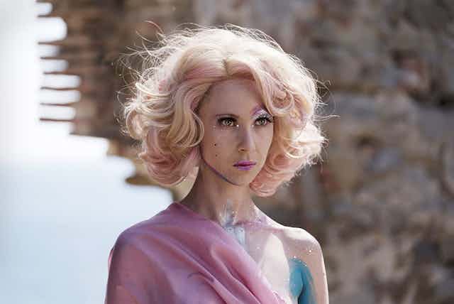Blonde woman in fantasy make-up