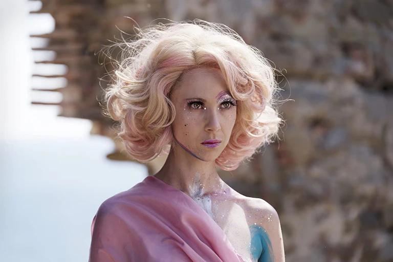 Blonde woman in fantasy make-up