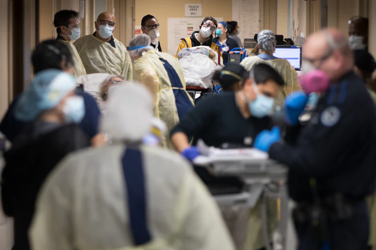 Patients and staff fill a Long Island hospital hallway during New York's coronavirus spike in April.