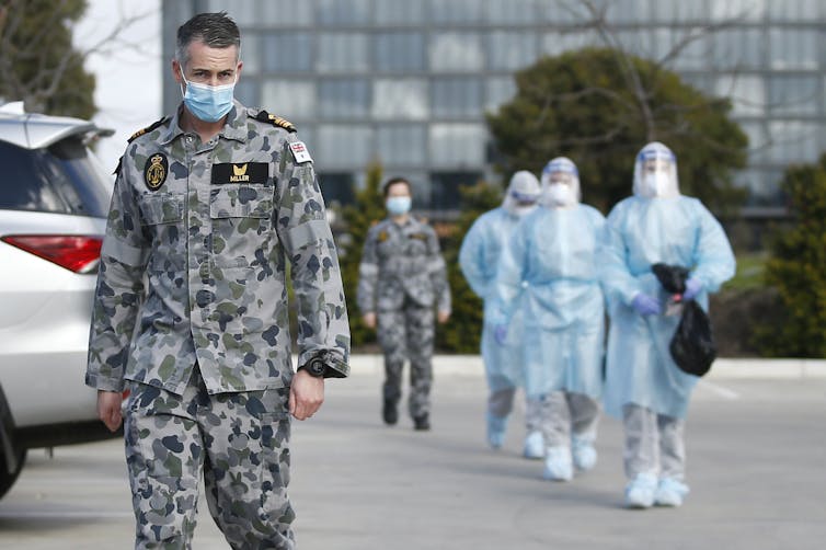 Australian Defence Force personnel arrive at Epping Gardens Aged Care Facility in Melbourne's north