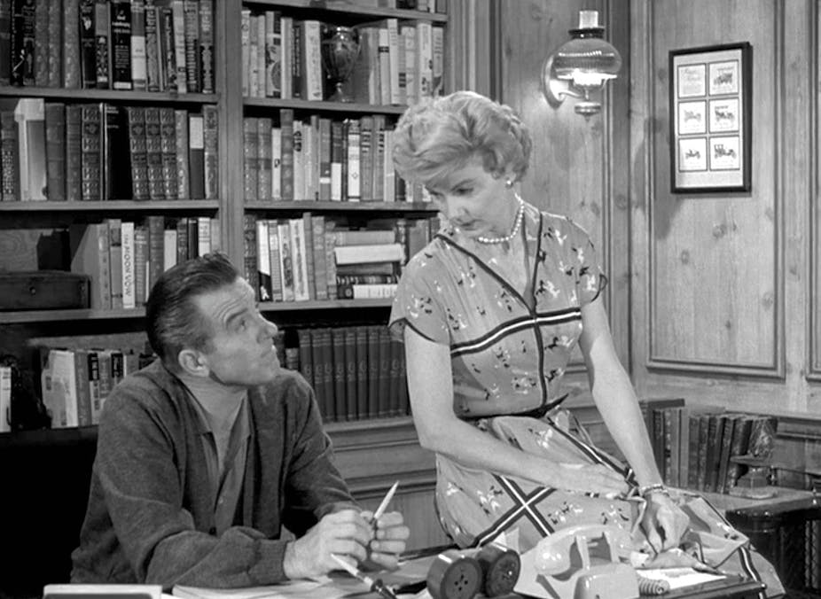 'Leave It to Beaver' character June Cleaver sits on the desk of her husband, Ward Cleaver.