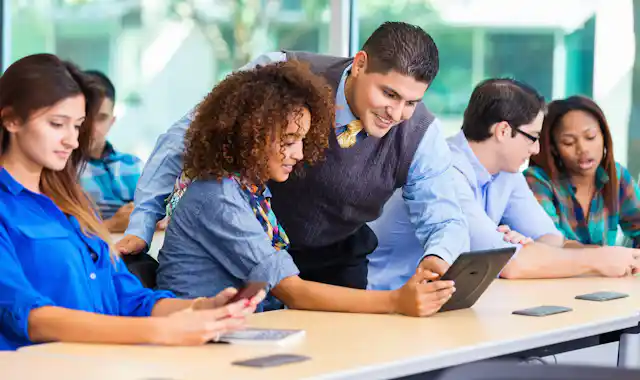 College students learning to be anti-racist teachers, in a classroom.