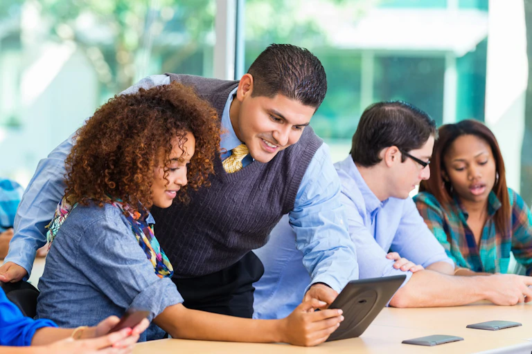 College students learning to be anti-racist teachers, in a classroom.