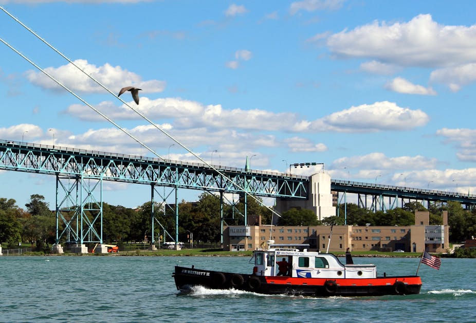 A boat on the Detroit River delivers mail to and from ships.