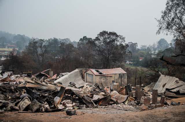 The remains of a house flattened by bushfires