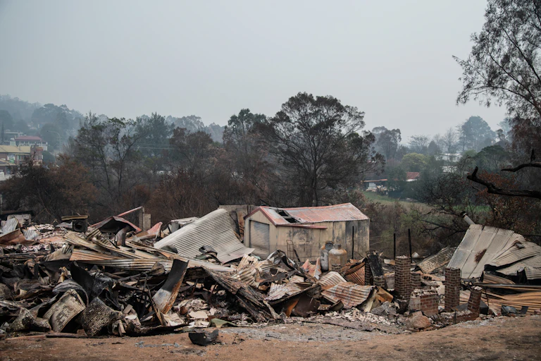 The remains of a house flattened by bushfires