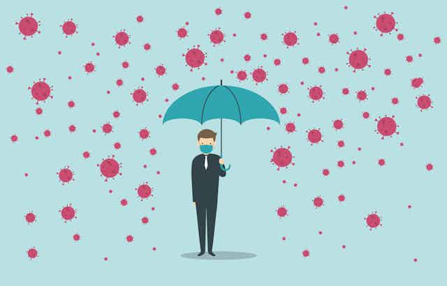 A graphic showing a person wearing a mask and holding umbrella being protected from a rain of coroanvirus
