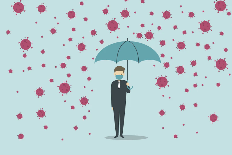 A graphic showing a person wearing a mask and holding umbrella being protected from a rain of coroanvirus