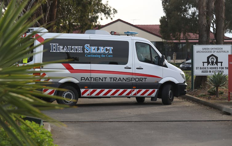 An ambulance arrives at St Basil's home for the aged in Melbourne.