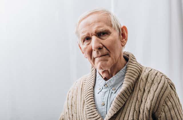 Elderly man looking serious 