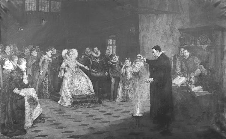 16th-century gathering including Elizabeth I and her court, watching Dr John Dee, an alchemist, perform magic.