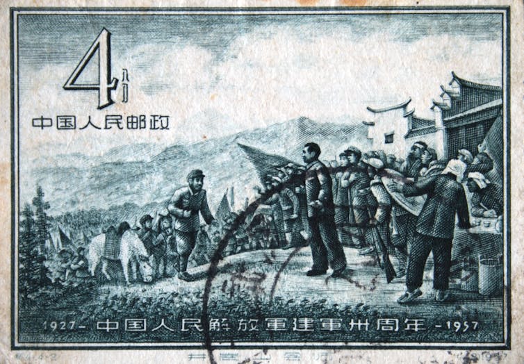 Stamp from 1957 showing Mao meeting peasants.