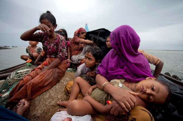 Rohingya women on a boat fleeing from Myanmar