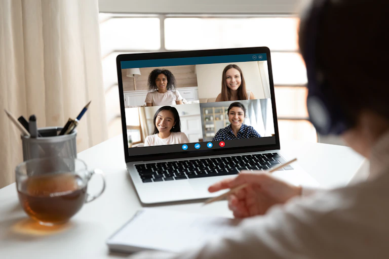 A screenshot of people on a videoconferencing.