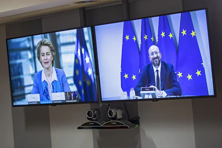 European Council President Jean Michel and European Commission President Ursula von der Leyen on video screens.