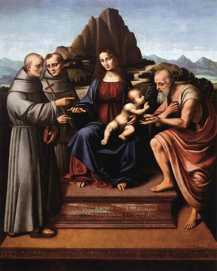 Painting of Mary and Jesus in front of a mountain range.
