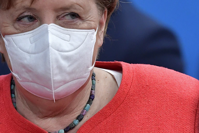 Angela Merkel wearing a mask.