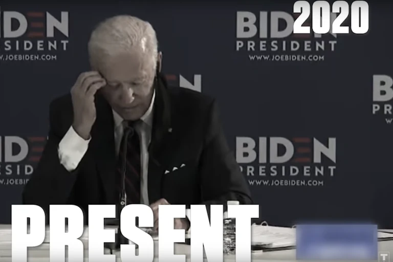 Joe Biden with hand to his head
