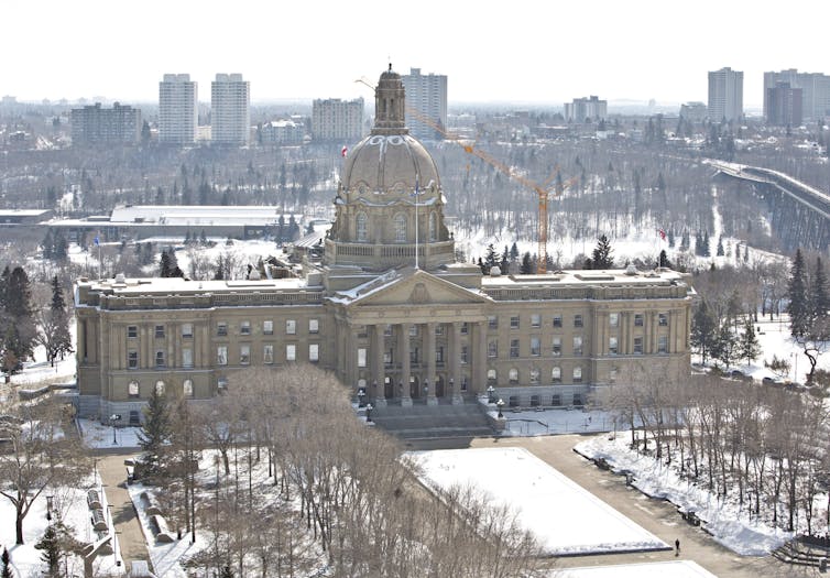 View of Alberta legislature from above, in winter.