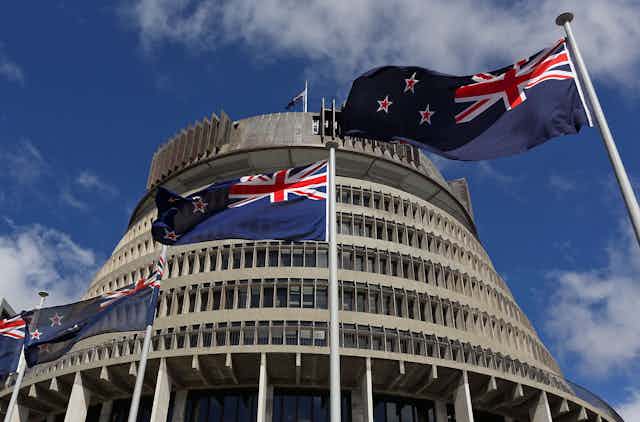 New Zealand parliament building and New Zealand flags