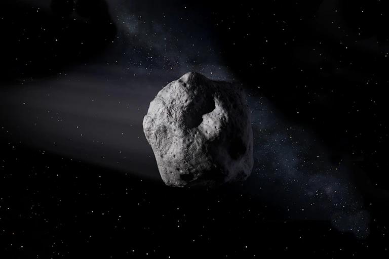 A drawing of an asteroid in space.