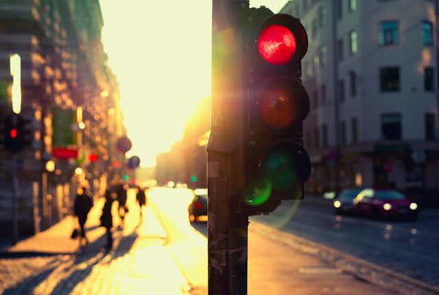 Red traffic light on street