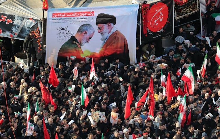 Iranians attending the funeral of major general Qassem Soleimani in Tehran.