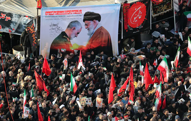 Iranians attending the funeral of major general Qassem Soleimani in Tehran.