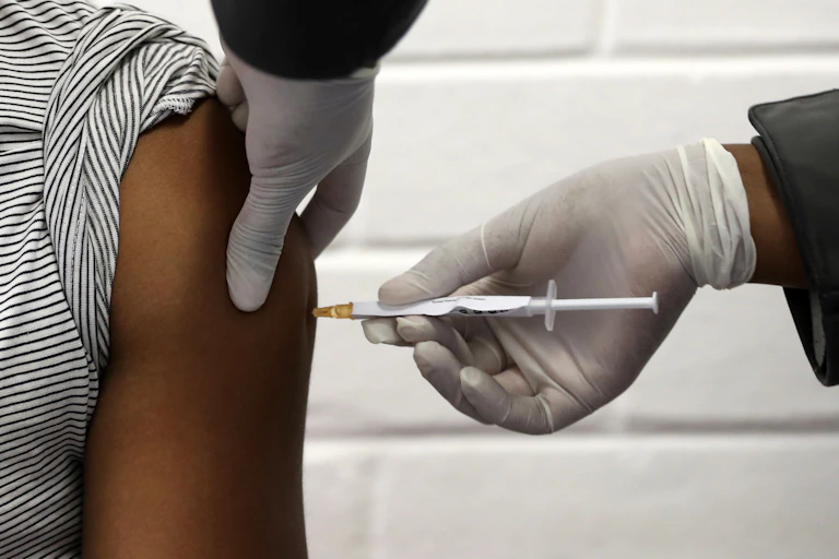 Vaccine being injected into arm