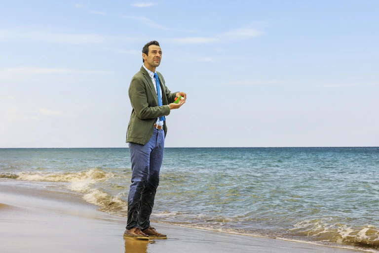 Ralph Little on a beach in Guadeloupe