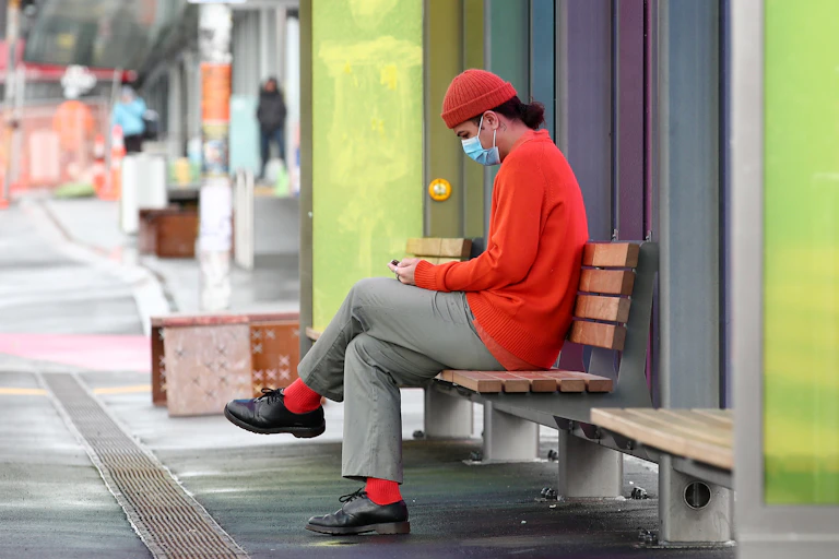Woman at bus stop