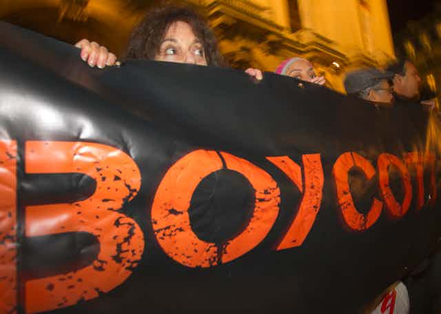 Sign saying "boycott"