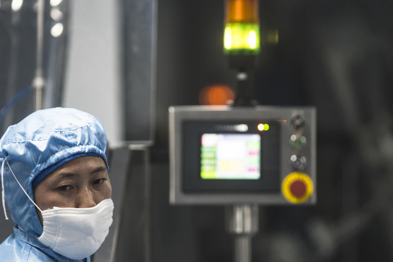 Scientist working at Sinopharm.