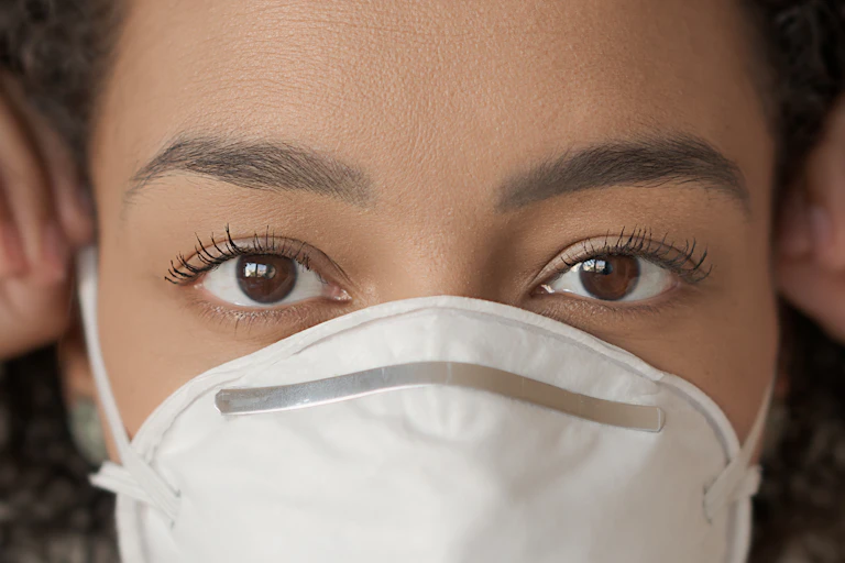 Closeup of woman wearing face mask