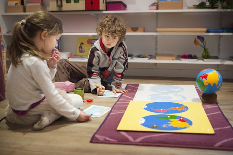 Two kids attending a bilingual Montessori school in Haute-Savoie, France