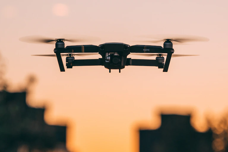 Drone over sunset sky