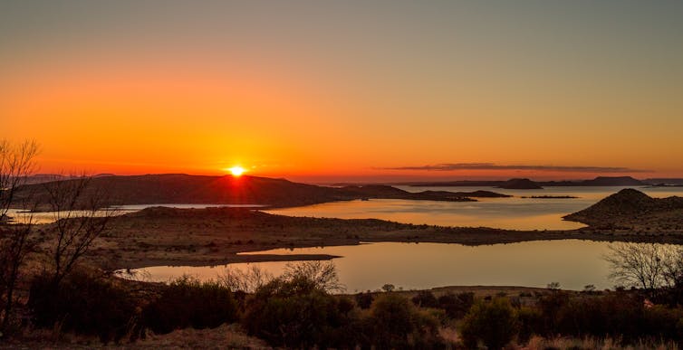 Sunset over a river.