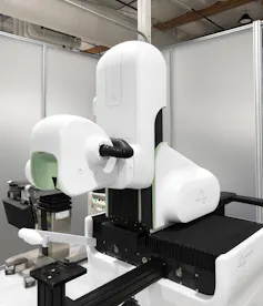 a machine with a helmet-like component in a laboratory
