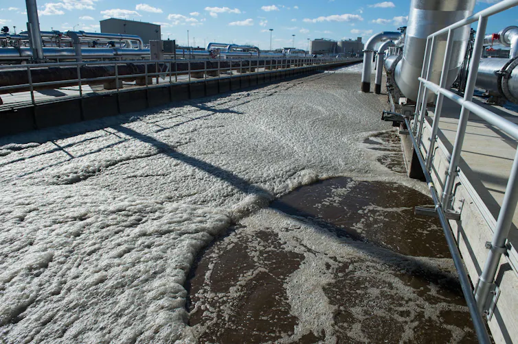 huge tank of wastewater at a treatment plant